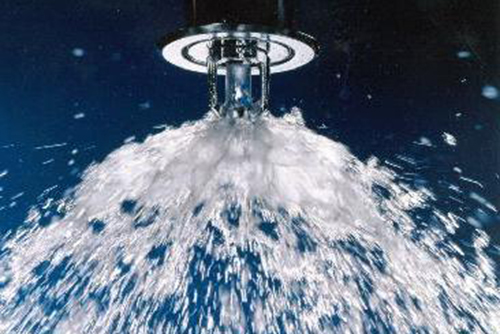 A closeup look of a shower spraying water